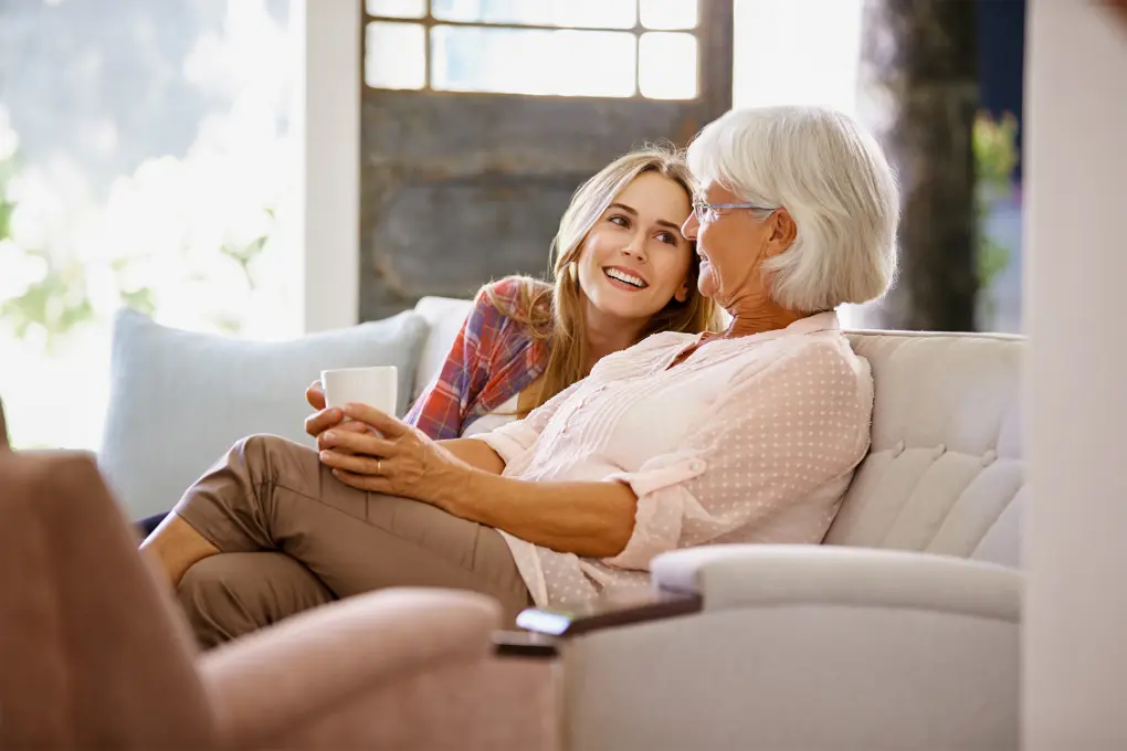 ABC grandmother and grand daughter smiling
